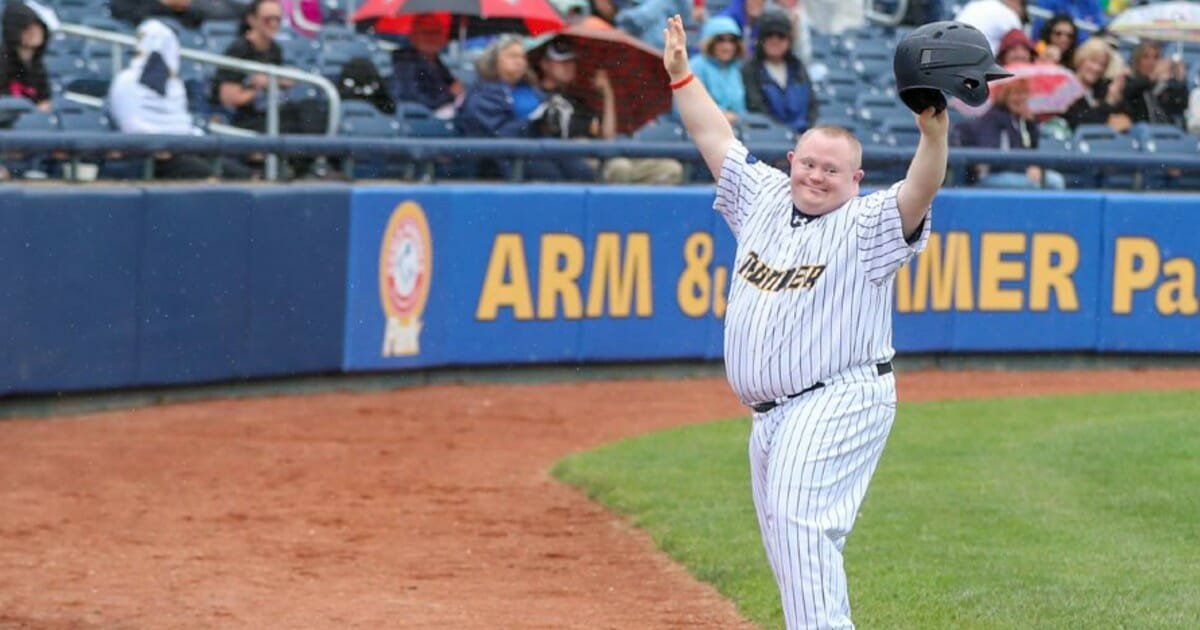 Beloved bat boy with special needs honored with his own bobble head during Minor League Baseball game