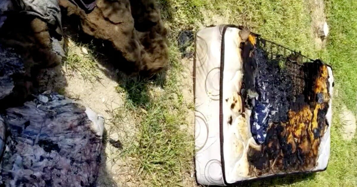 Officials warn public after unattended phone charging on bed catches fire
