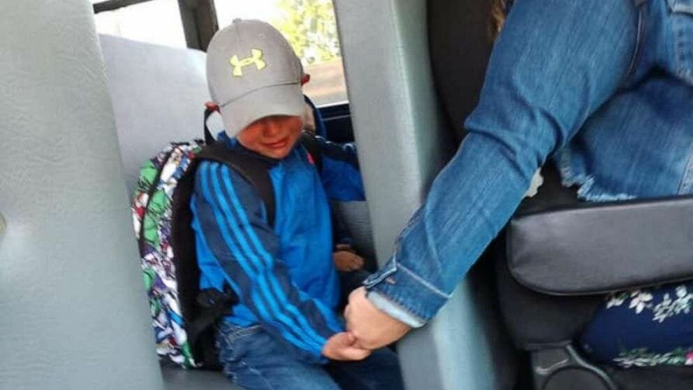 Bus driver holds nervous 4-year-old boy's hand on his first day of school – help us pay tribute