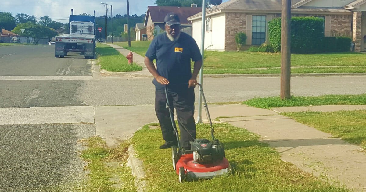 School bus driver sees kids waiting in overgrown weeds, so he mows the bus stop himself — let's thank him