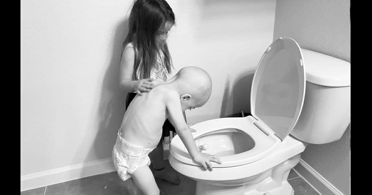 Sister comforts sick little brother battling leukaemia in heartbreaking photo – let's pray for them