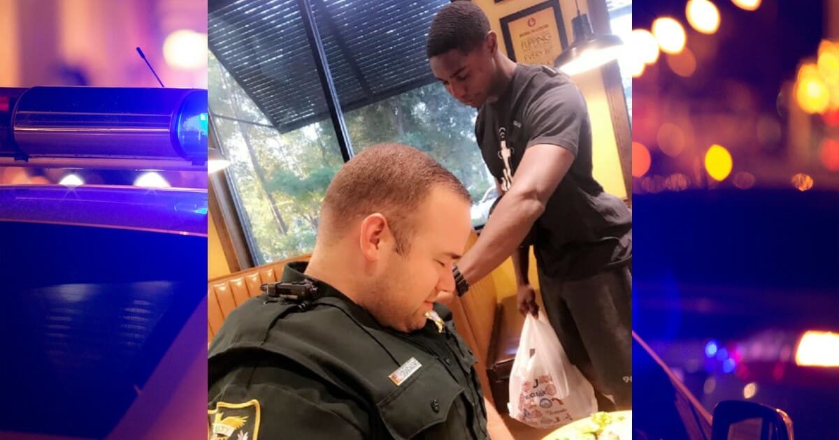 Teen prays with sheriff's deputy in restaurant, and now the photo is going viral