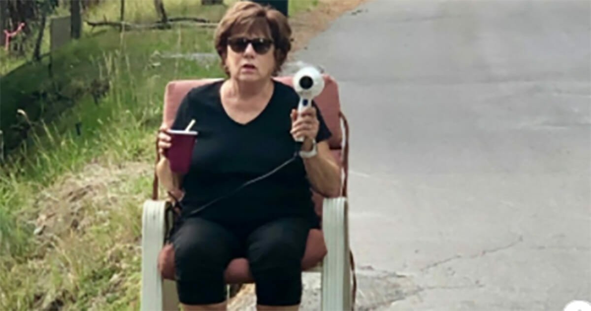 Ticked off grandma teaches speeding drivers a lesson armed with only a hair dryer and a stern expression