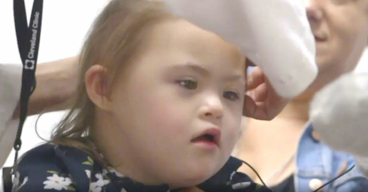 2-year-old cancer survivor with Down syndrome hears for first time