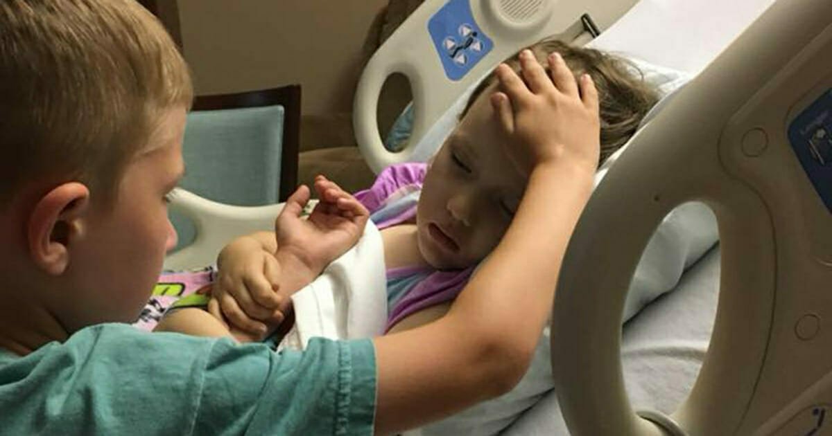 6-year-old brother comforts his dying sister as she holds on to him in heart-wrenching moment