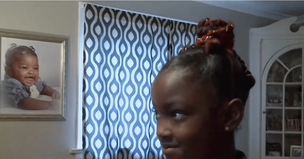 8-year-old girl with red hair left in tears after she was denied a school photo