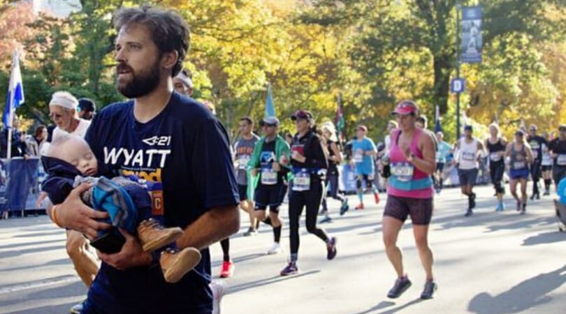 Dad carries newborn son with Down syndrome over Marathon finish line – let's hear it for them