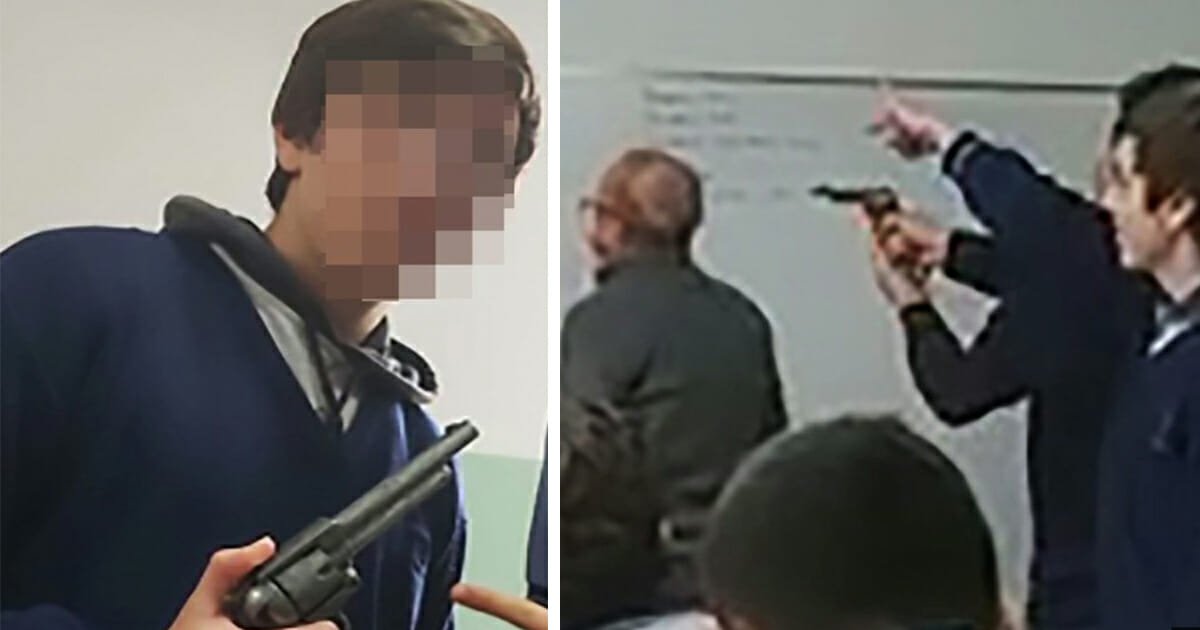 New footage shows moment student points gun at back of teacher's head while he teaches class
