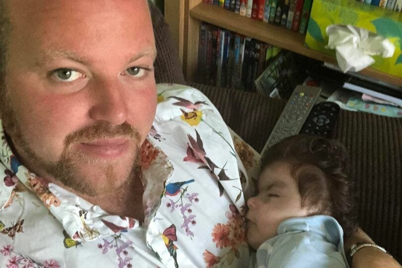 Single super dad of five left heartbroken by sudden death of son, 2, he adopted