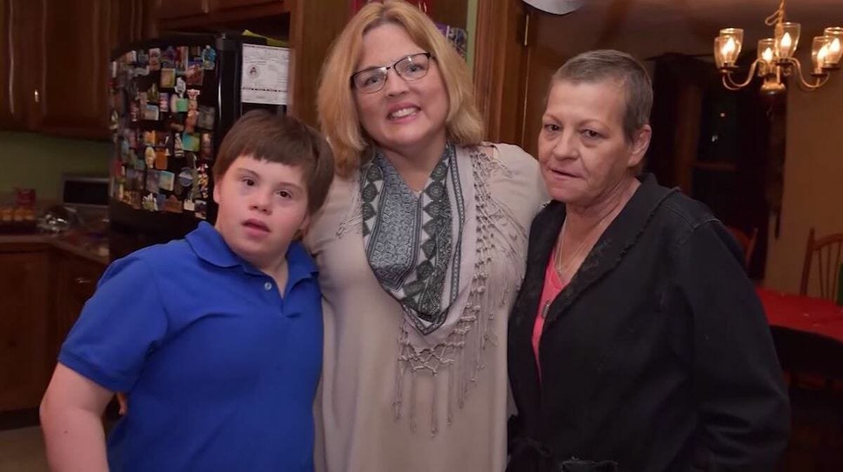 Teacher adopts student with Down syndrome after his mother dies of breast cancer