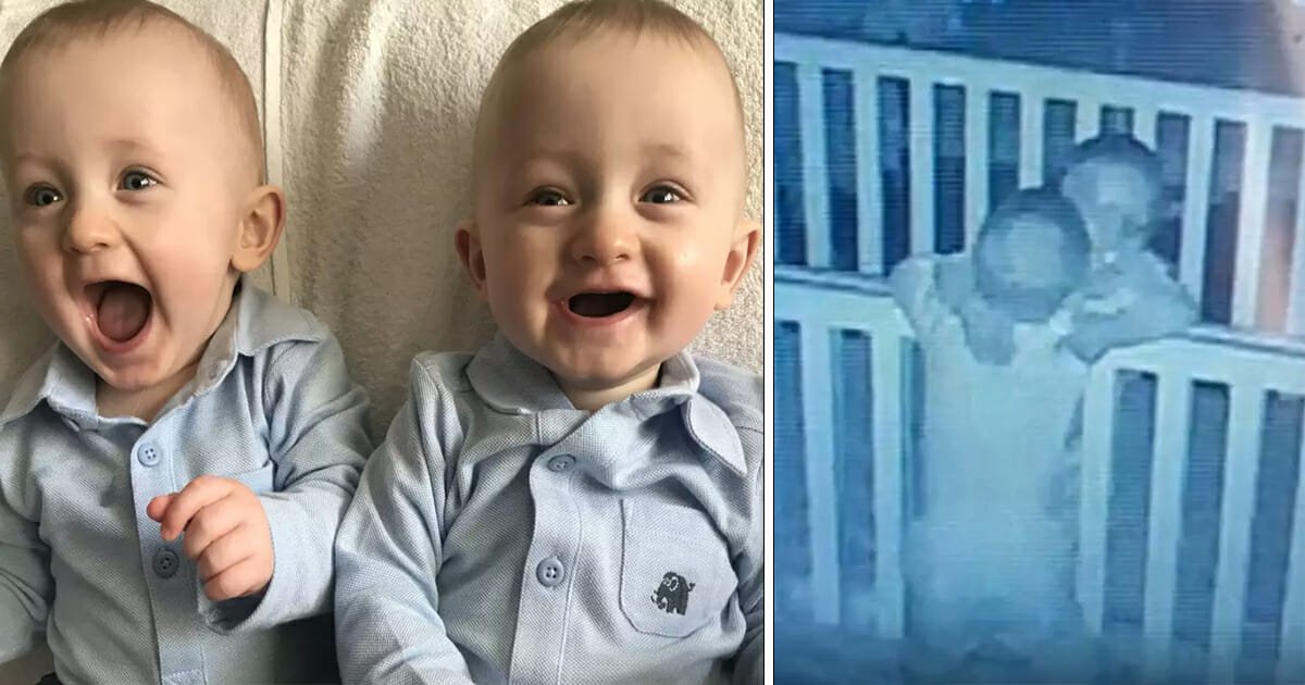 Mom watches baby cam because her twins are always wrestling, catches moment they hug before nap