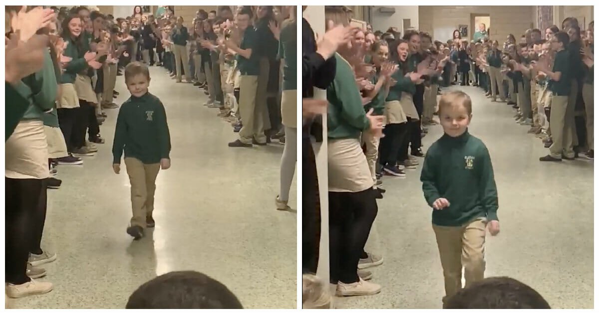 6-year-old boy gets standing ovation from classmates after beating cancer