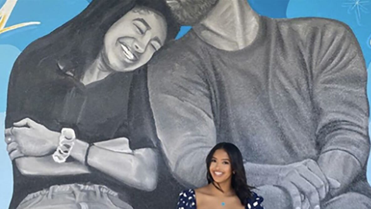 Kobe Bryant's eldest daughter poses in front of mural honoring of her dad and late sister Gigi